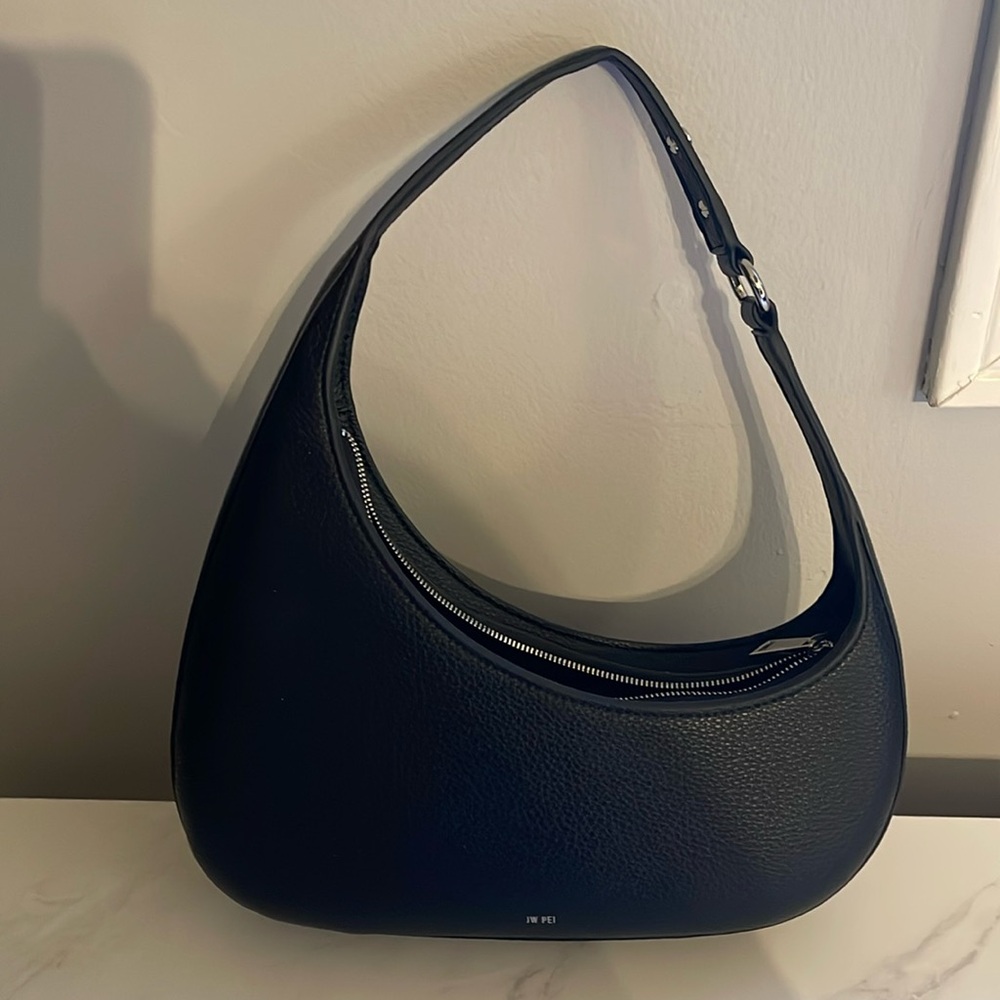 JW Pei half moon shaped black bag.